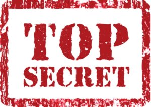 The words TOP SECRET in red on white background