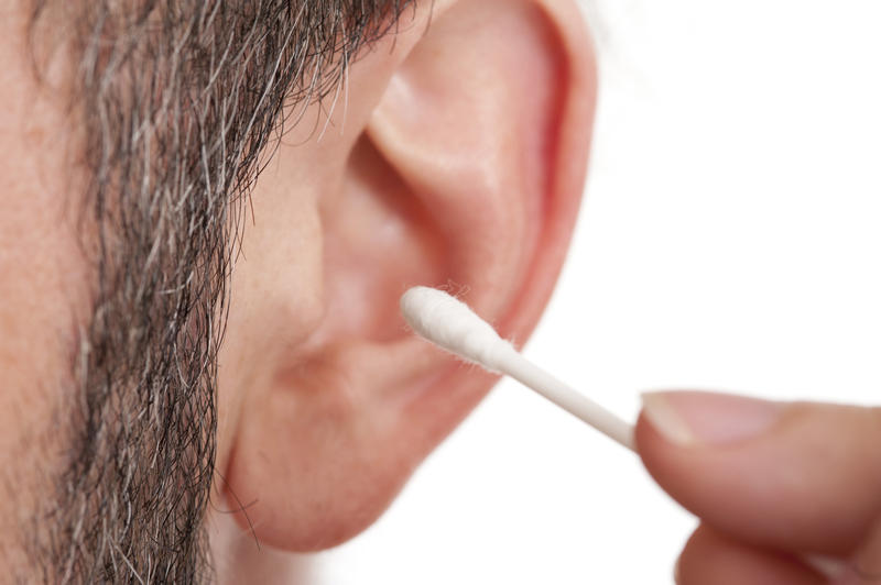 Q-Tip in man's ear