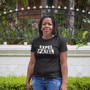 Black Political T-shirt - Expel Priti Patel
